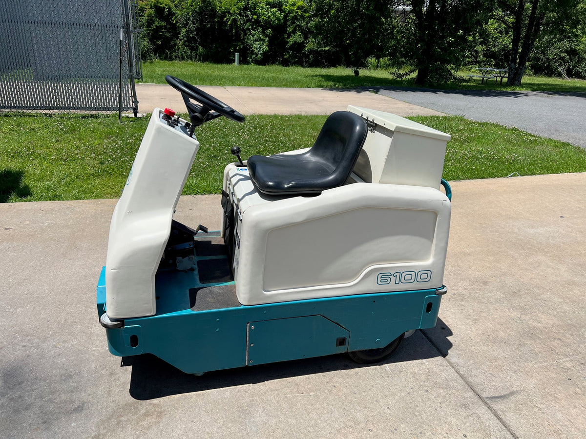 Refurbished Tennant 6100, Rider Floor Sweeper, 30", 22 Gallon Hopper, Battery, 9/1/1 Warranty